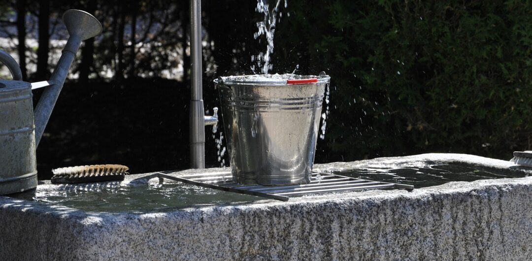 Unusual New Year's Traditions - puerto rice bucket of water