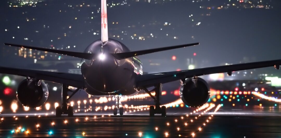 Top US Airports - airplane at night