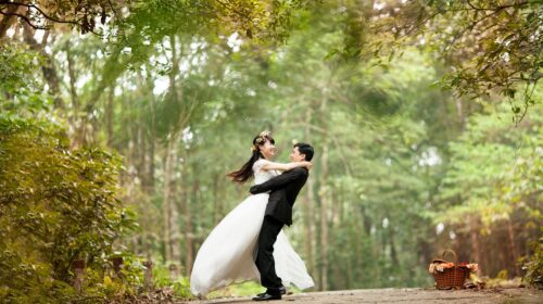 The Best Bridal Hair and Makeup Teams for Outdoor Weddings - Happy Wedding Couple in Woods 4 Smart Tips to Plan a Destination Wedding (& Make it Amazing)