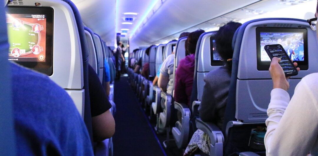 How to Avoid Flight Roaming Fees 6 Best Companies for Airport Transfers - Airplane Aisle Preparing For Your Next Trip Abroad Is Easier Than You Think