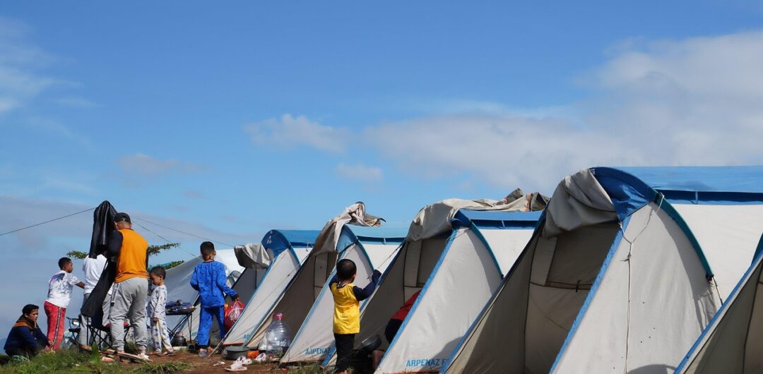 Advice To Ensure Your Next Family Camping Trip Is A Success - Family with Tents

How Camping Trips Create a More Relaxed Travel Experience