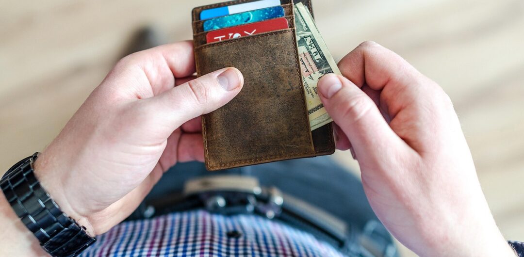 Understanding The Financial Faux Pas That Are Holding Your Back - Man Taking Money Out of a Wallet Why Vacancy Costs More than Most Landlords Expect

How to Keep Your Business Running While You Travel