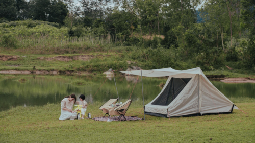 The 3 of The Best Types Of Vacations For Kids - Mother and Child Camping by a Lake 6 Different Ways of Camping for Every Kind of Camper How Camping Trips Create a More Relaxed Travel Experience