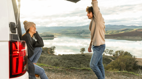 Family Snack Box Road Trip Planning: 5 Aspects To Not Overlook - Couple Hanging Out in the Back of Van Why Road Trips Make Amazing Weekend Resets