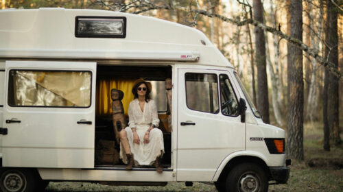 Planning Your First RV Road Trip in 2026: Three Important Elements to Consider - Woman Sitting in a Van Repair or Sell? The True Cost of a Broken RV