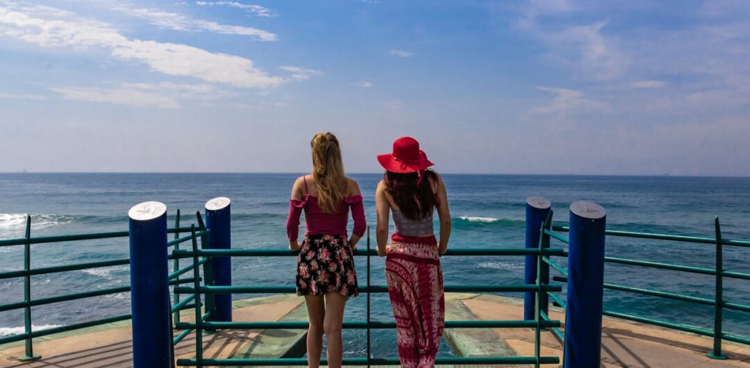 Food-Focused Travel: How to Find Local Flavor Without Over-planning 4 How Can You Plan Travel without Falling for Viral Tourist Traps - Two Women Standing on a Pier
Food-Focused Travel: How to Find Local Flavor Without Over-planning