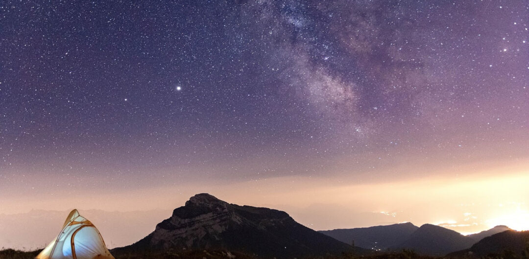 How Camping Trips Create a More Relaxed Travel Experience - Tent Under Starry Sky