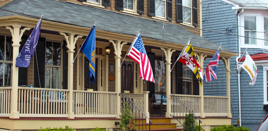 Magical Maryland: A Guide For First-Time Visitors - Historic House with Flags in Annapolis