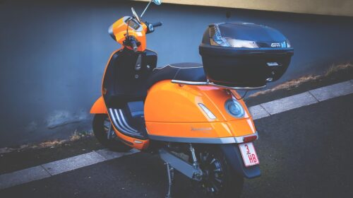 4 Reasons a Scooter Is Perfect for Short Trips - Orange Scooter