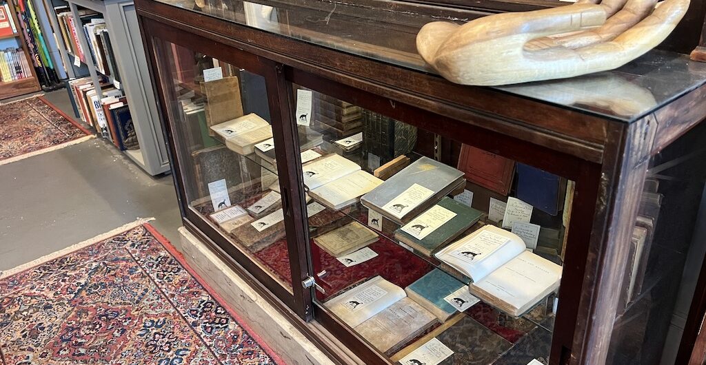 Best Bookstores in Savannah GA: Top Local Gems to Visit 2 Best Bookstores in Savannah GA Books on Bay glass case