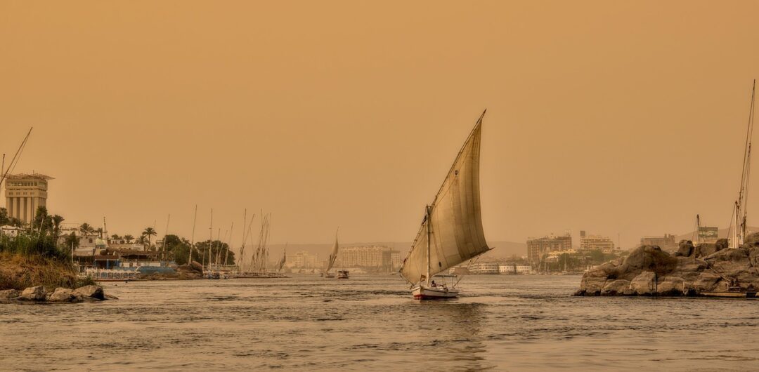 The Most Meaningful Cultural Experiences in Egypt for Curious Travelers - A Sailboat on the Nile at Sunset