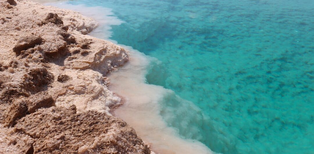 The Most Meaningful Cultural Experiences in Egypt for Curious Travelers - Blue Water at the Siwa Oasis